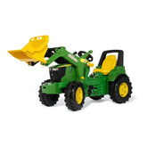 Rollyfarmtrac John Deere 7310R toy tractor in matte plastic with yellow seat and scoop, black wheels, and green engine.