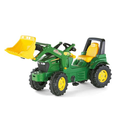 Rollyfarmtrac John Deere 7930 toy tractor in green with yellow accents, featuring large wheels and a scoop attachment.
