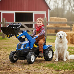 Young boy in brown overalls and red bandana rides a blue New Holland tractor with a large white dog on green grass.