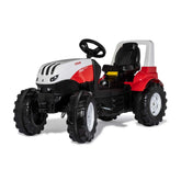 Rollyfarmtrac Premium II Steyr 6300 Terrus CVT toy tractor in matte and glossy plastic with black fabric seat and black wheel