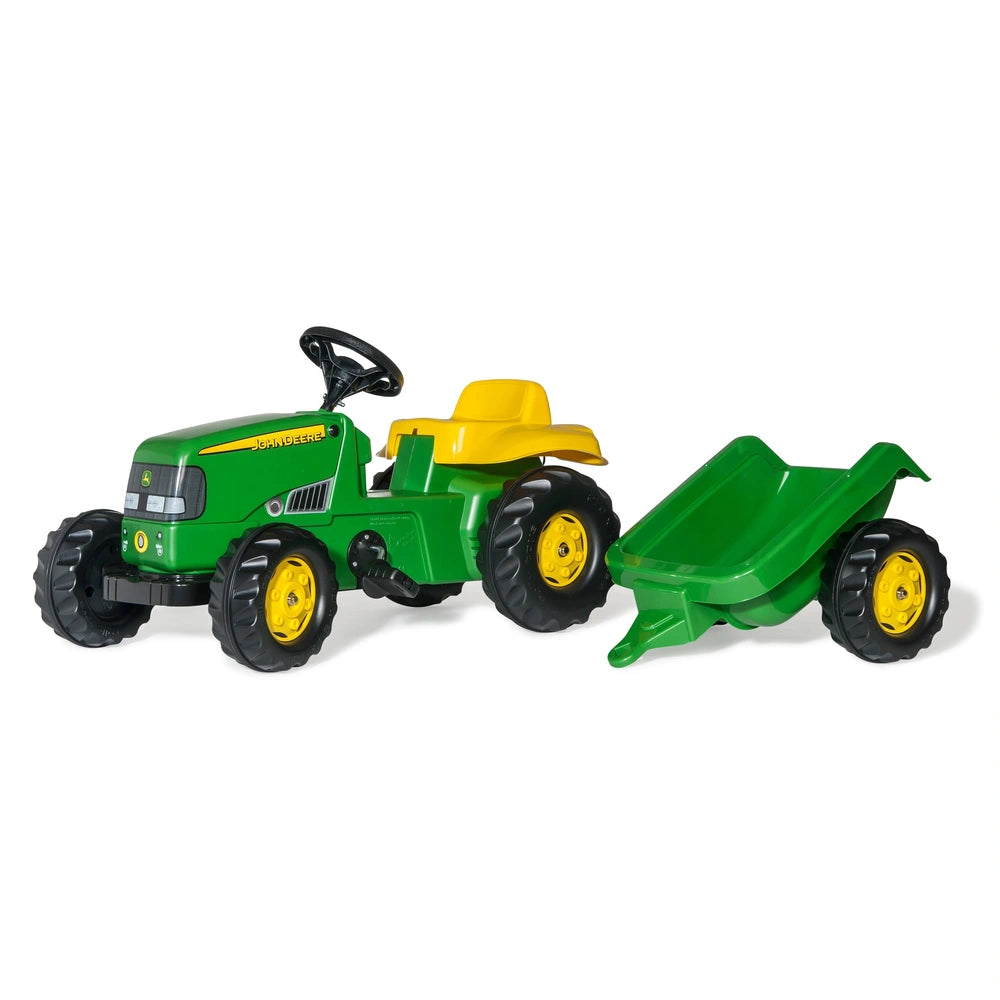 Rolly Toys John Deere tractor with a green body and yellow wheels, paired with a matching trailer, on a white background.