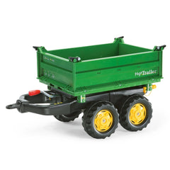 Rollymega green trailer features a plastic bed, black frame, yellow wheels, and red handle with "MegaTrailer" branding.