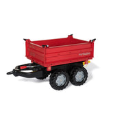 Rollymega Red Trailer features a sturdy design with four wheels, a hitch, and a spacious trailer bed for riding fun.