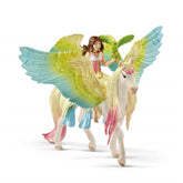 Fairy Surah figure in pink and white dress rides a glossy-winged pegasus with a matte body, featuring brown hair and a blonde