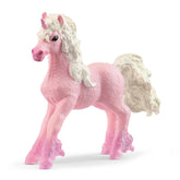 Pink flower unicorn foal toy with a matte finish, glittery mane and tail, featuring a horn, eyes, and hooves.