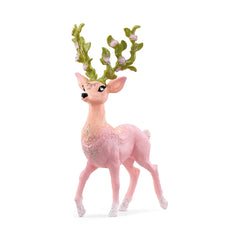 Pink Schleich Bayala Magic Deer figurine with green antlers, smooth surface, and detailed features like ears, eyes, and legs.