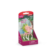 Schleich Bayala Magical Fawn action figure in pink glossy box with transparent window, featuring multilingual text and age ma