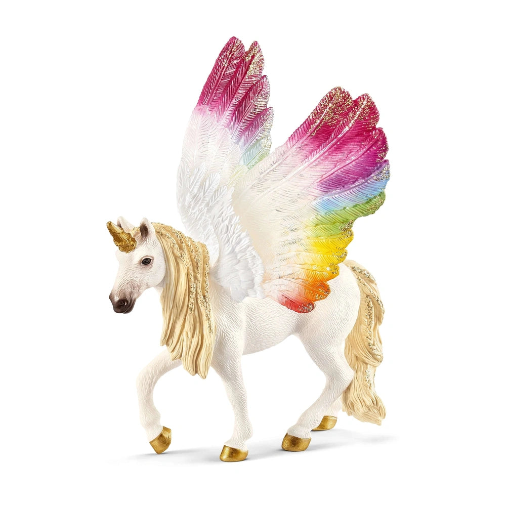 Winged rainbow unicorn figurine with a glossy white body and vibrant rainbow wings, standing on a smooth surface.
