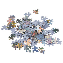 Schmidt Spiele Bambi puzzle pieces in various colors scattered on a white background, showcasing unique interlocking shapes.