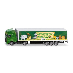 Articulated toy truck in green with a colorful zoo-themed trailer featuring animal silhouettes and "Welcome to the Zoo" text.