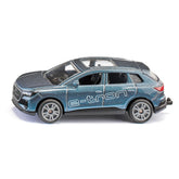Siku Audi Q4 e-tron toy car in blue with white text, featuring glossy plastic, transparent windows, and detailed components.