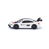 Siku BMW M4 Racing 2016 in glossy white with a blue roof, red and blue stripes, black wheels, and tinted windows.