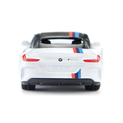 Siku BMW Z4 M40i play vehicle in glossy white with black roof, transparent windows, black metal wheels, and metallic badge.