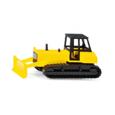 Siku bulldozer features a yellow matte body, black bumper, roof, and windows, with four textured tires and a clear side windo