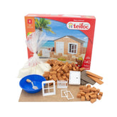 Teifoc beach house construction set includes plastic bricks, a blue bowl, and window components in a red box.