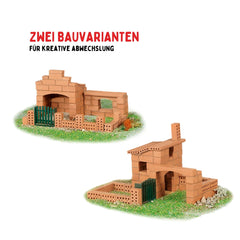 Teifoc Spanish style house set featuring two brown brick houses with green roofs and grass in a cartoon-like design.
