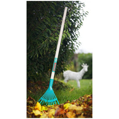 Theo Klein Bosch Garden greenery rake with a blue plastic head and white textured handle, designed for outdoor play.