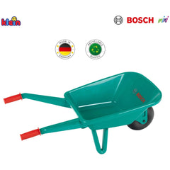 Theo Klein Bosch garden wheelbarrow in green plastic with red handles and black wheel, featuring "MADE IN GERMANY" text.
