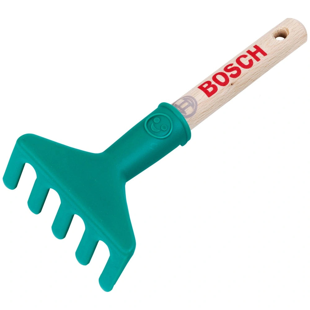 Theo Klein Bosch Garten hand rake with a brown wooden handle and green plastic head, featuring logo and holes for hanging.