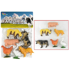 Farm animal figures in various colors arranged on a clear plastic sheet, showcasing cows, pigs, and chickens.