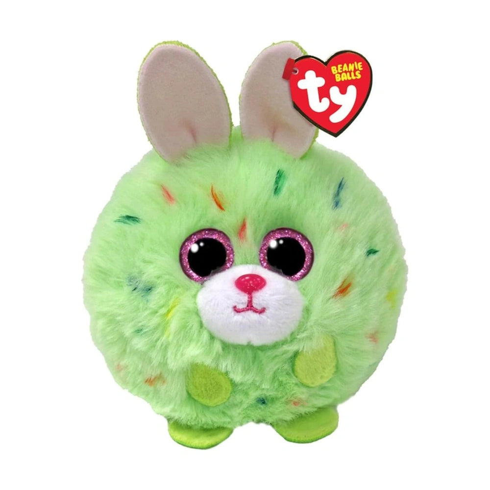 Green plush rabbit toy with large black eyes, pink nose, and glittery details, featuring a round body and big ears.
