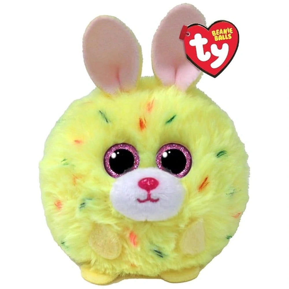 Bright yellow plush toy rabbit with a pink face, large ears, and a heart, featuring glossy eyes and colorful patterns.