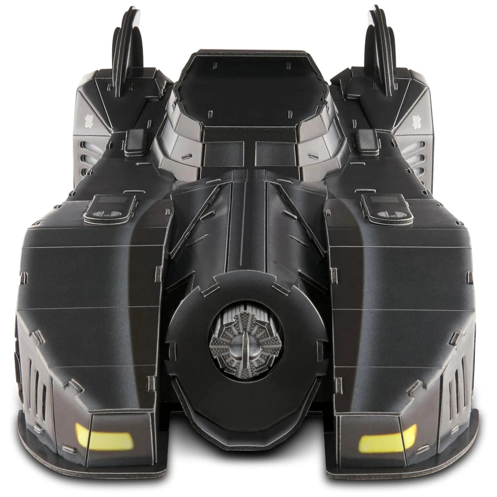 4D Build DC Batman Retro Batmobile model features a sleek black design with yellow accents and detailed components.