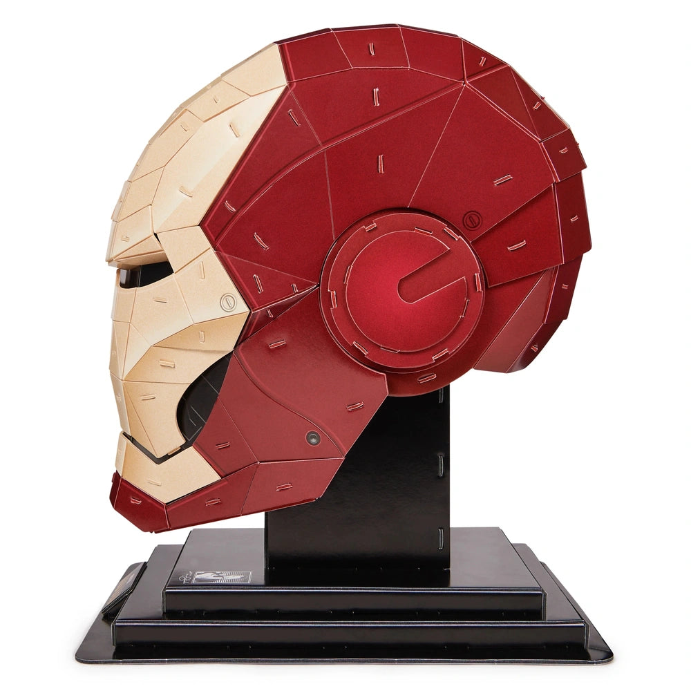 Red and black Iron Man helmet 3D puzzle model displayed on a black pedestal with glossy and matte finishes.