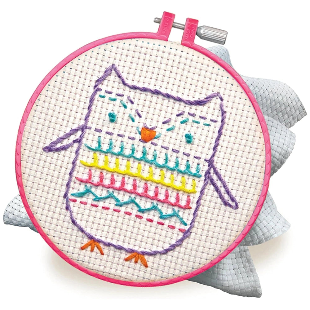 4M Easy to Do Embroidery Stitches kit featuring a colorful owl design on grid-patterned fabric with a pink border.