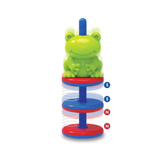 Green frog figure on a red and blue base, part of the 4M KidzLabs Fun Magnet Science Educational kit.