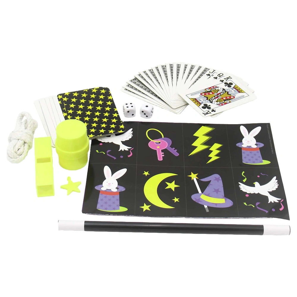 KidzLabs Magic Kit includes black playing cards, white dice, a white pencil, and a yellow container on a bordered black surfa