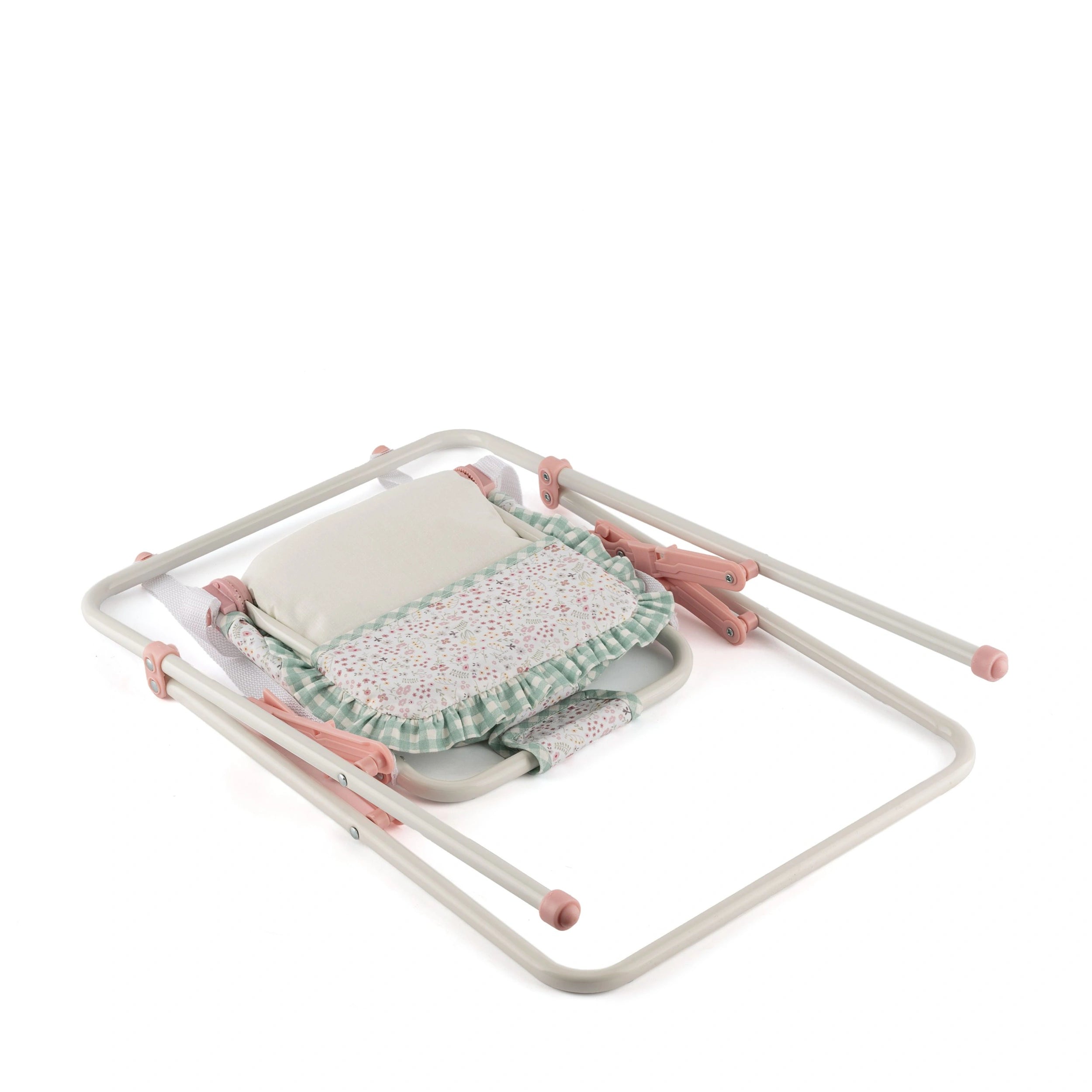 Folded pastel pink and white swing frame with floral-patterned fabric seat for dolls, designed for easy assembly.