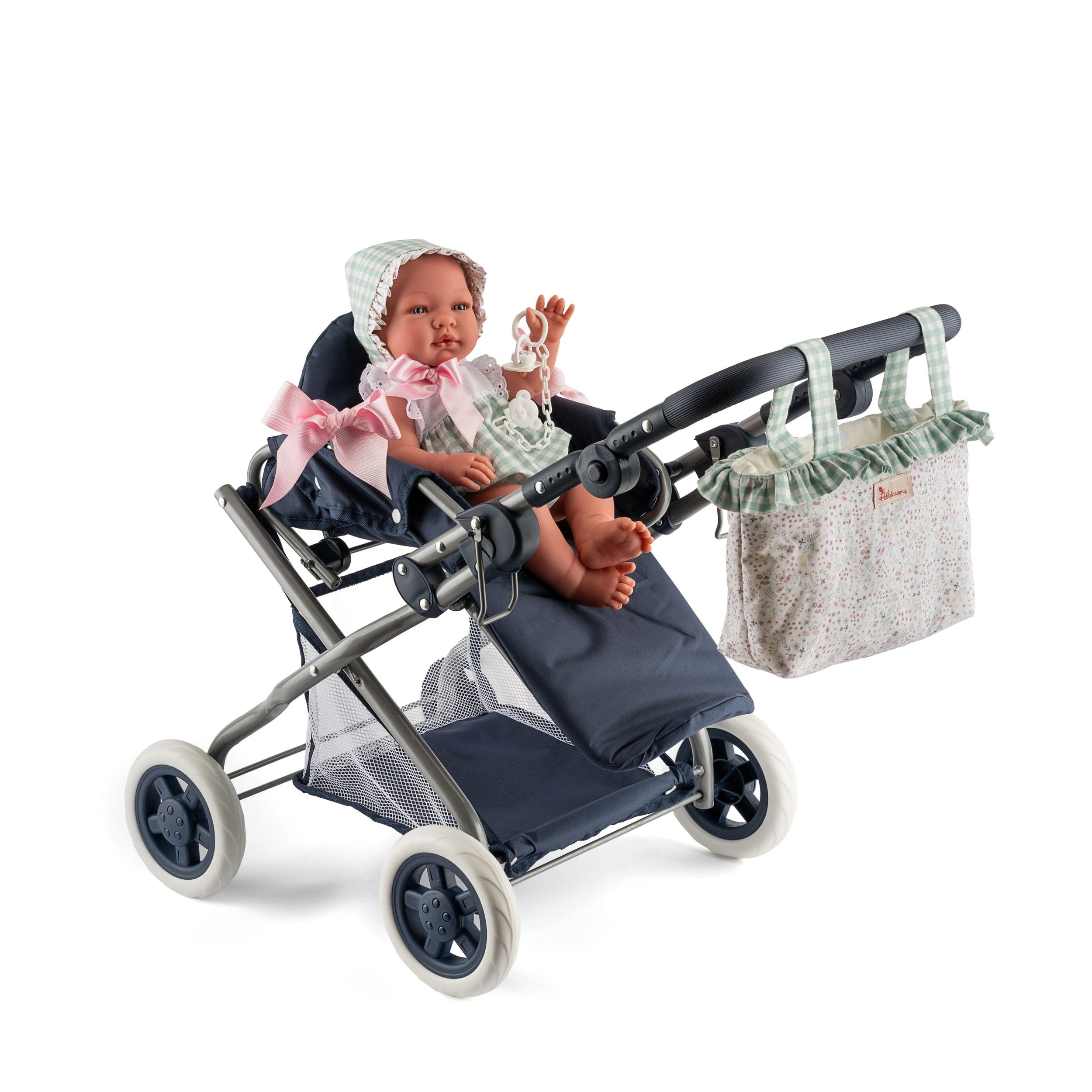 Cloe Baby Stroller with a doll, large cover, pink bow, and floral bag on handle.