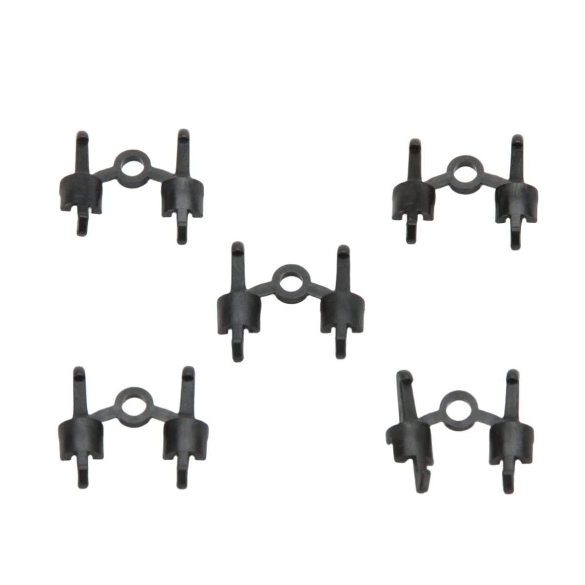 Five black spare couplings arranged in a pattern, compatible with Bruder toy vehicles.