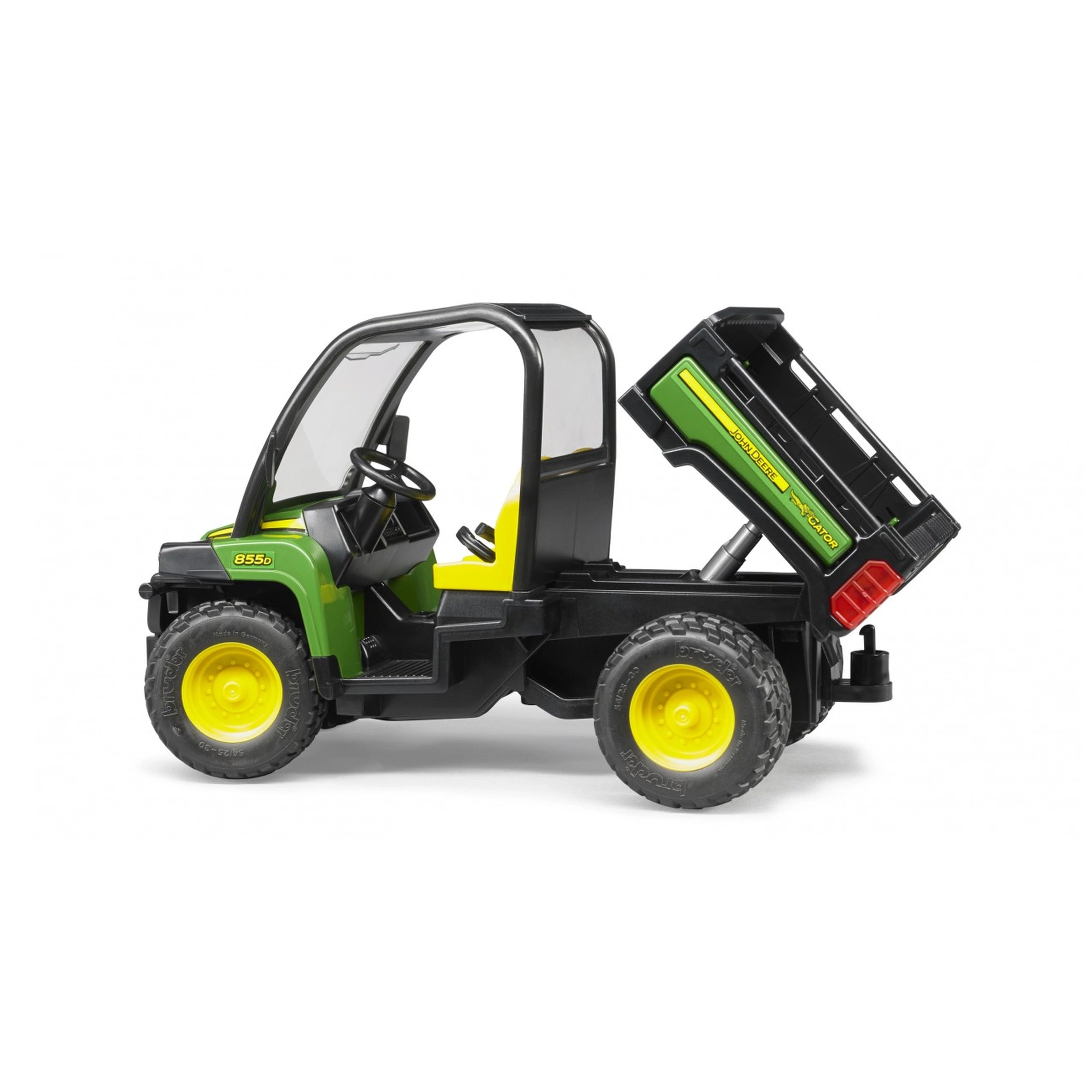 Bruder John Deere Gator XUV 855D toy in green and black, side view, with open cabin and tilting cargo bed.