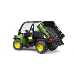 Green and black Bruder John Deere Gator XUV 855D toy with yellow wheels, tilting cargo bed, and open cabin.