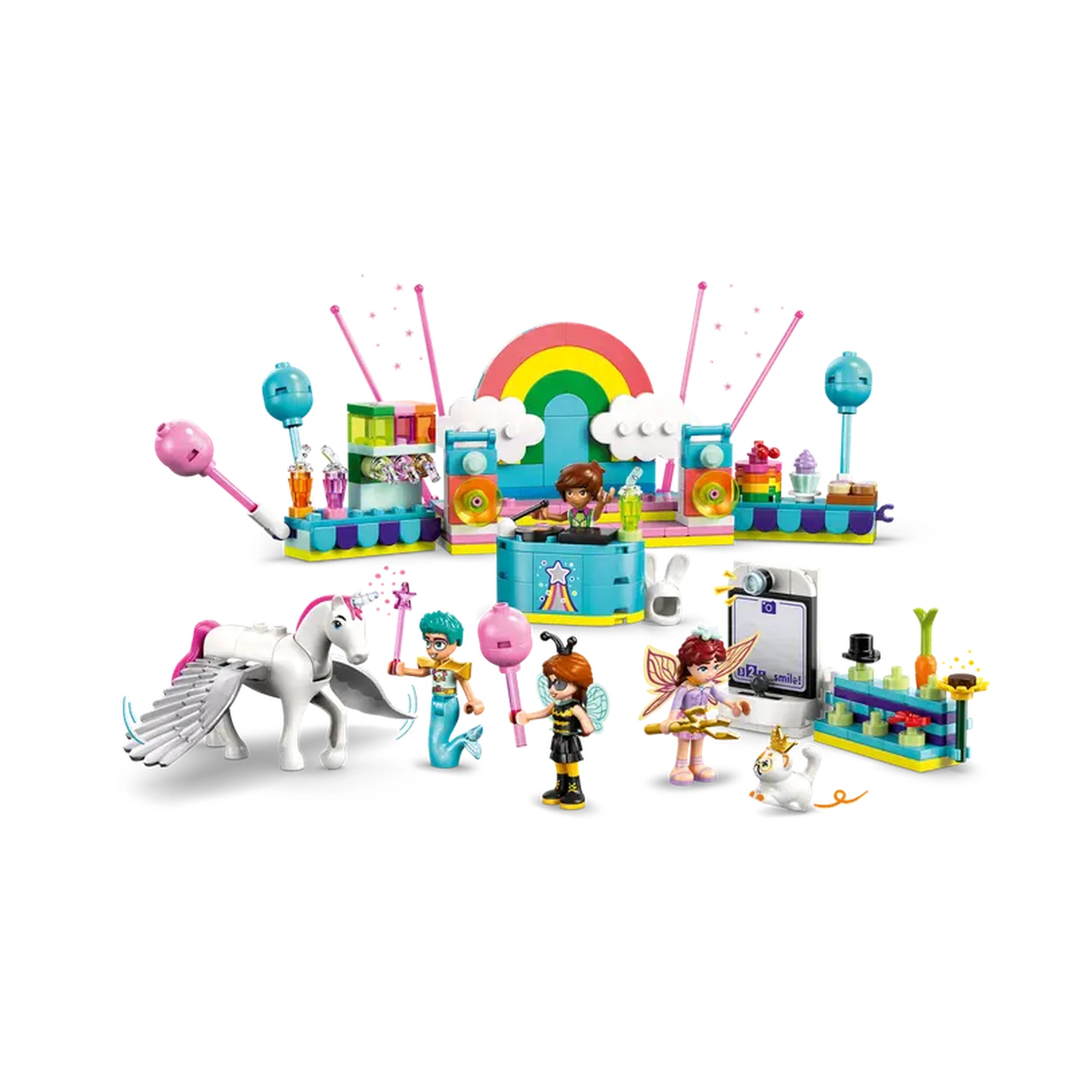 LEGO Friends Costume Party set featuring a colorful DJ stage with a rainbow backdrop, four minidolls, a playful unicorn, and festive decorations.