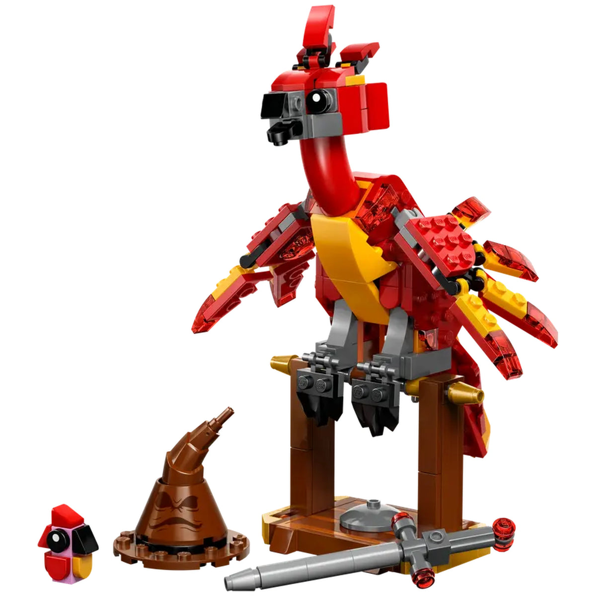 Highly posable LEGO® Fawkes™ figure stands on a buildable stand, featuring vibrant red and yellow colors with movable wings, a head, and beak. A small baby Fawkes figure and iconic accessories like the Sword of Gryffindor™ and the Sorting Hat™ are included.