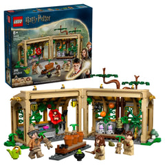 LEGO Hogwarts™ Castle Herbology Class set featuring a beautifully designed greenhouse with magical plants, removable tables, and three minifigures engaging in herbology lessons.