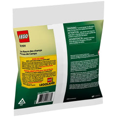 LEGO Botanicals Field Flowers construction set packaging, featuring official branding and multilingual safety warnings, designed for ages 9 and up.