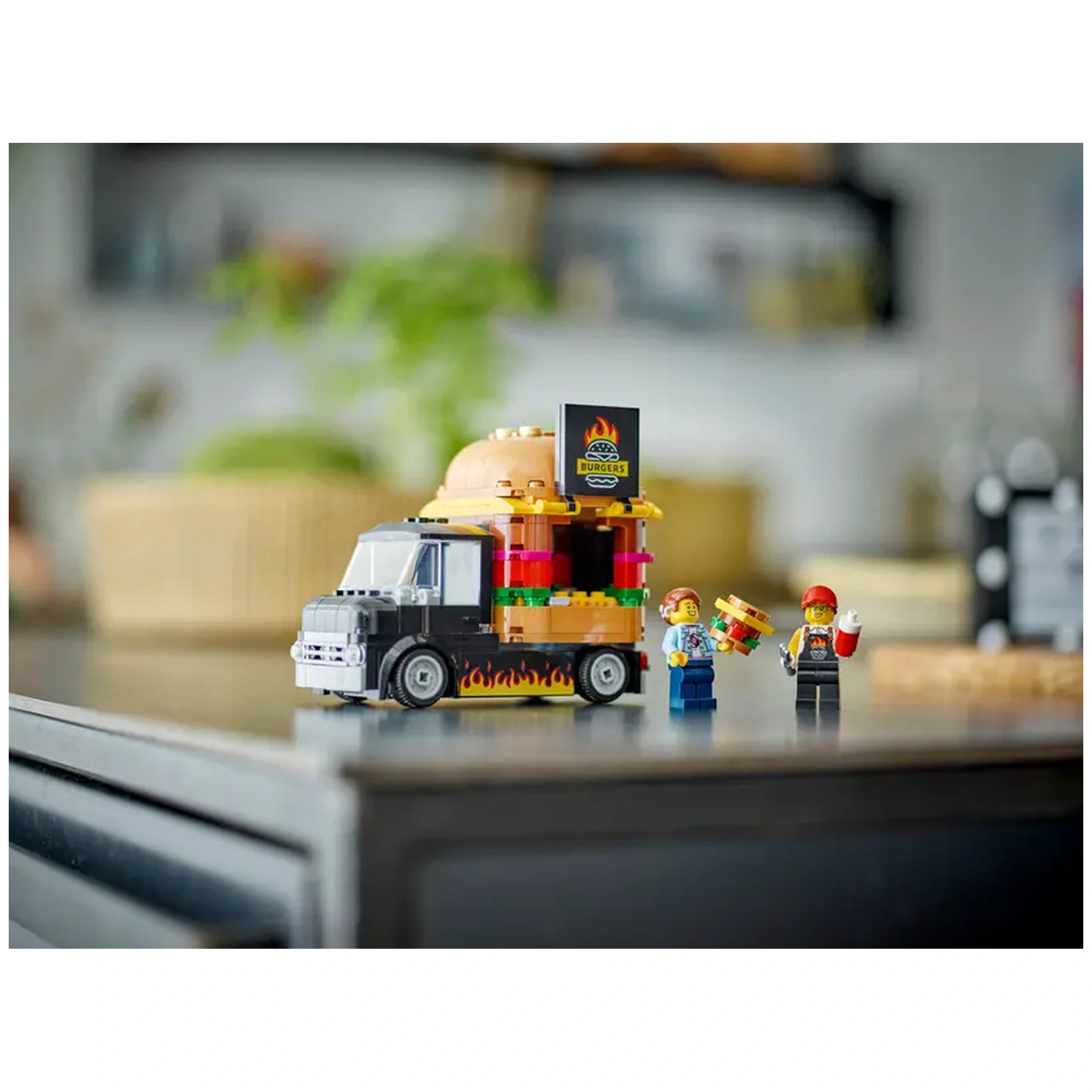 LEGO City Burger Truck set featuring a colorful food truck with a giant burger on top, two minifigures, and condiment accessories.