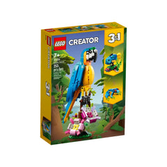 Colorful LEGO® Creator 3in1 Exotic Parrot set displayed in its box, featuring a vibrant parrot on a branch with flowers, surrounded by tropical foliage.