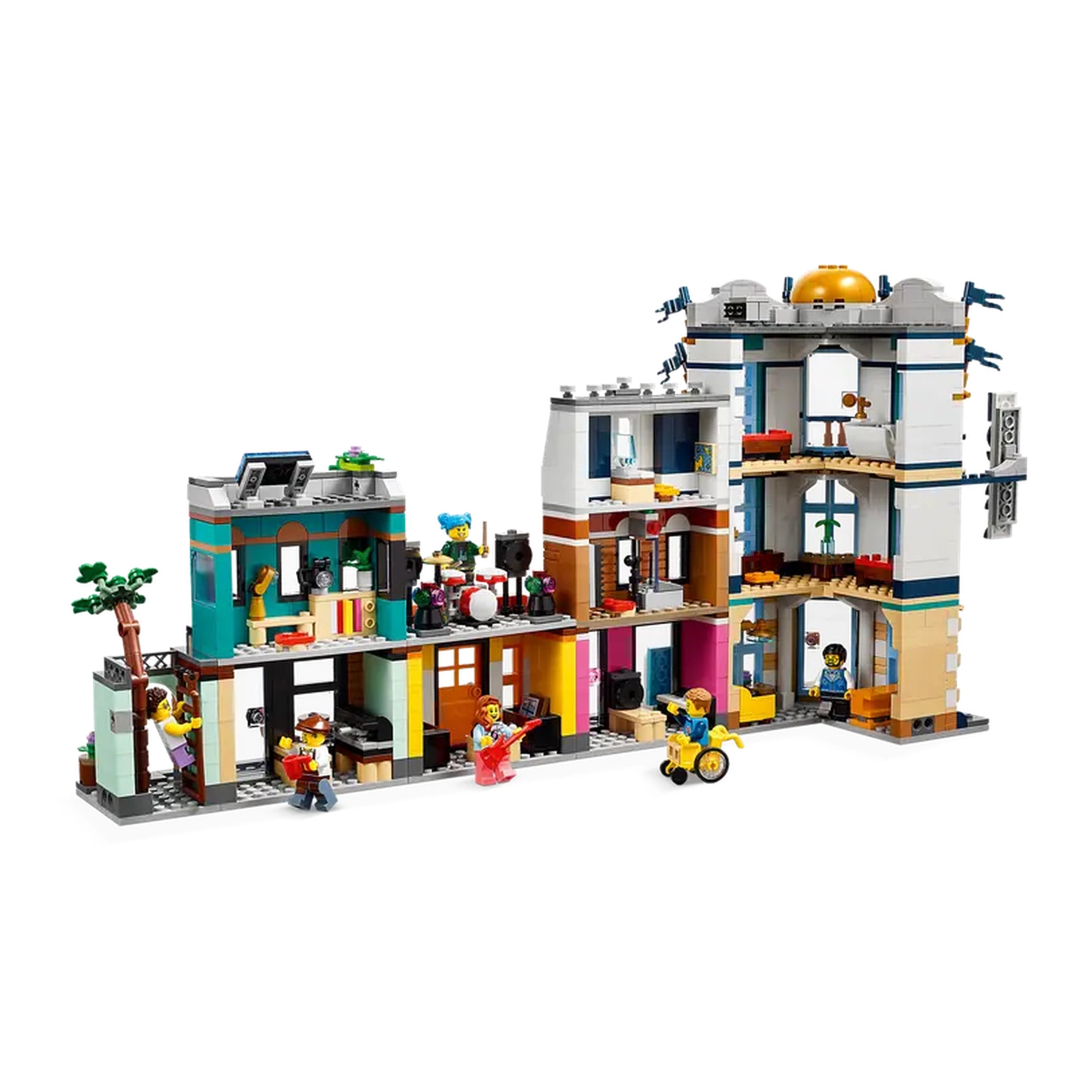 Colorful LEGO® Creator 3in1 Main Street set featuring four distinct buildings: a hotel, a music store, a café, and a record store, with mini-figures playing instruments and cycling.