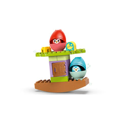 Colorful LEGO® DUPLO® Balancing & Stacking Tree set featuring two adorable owl figures in vibrant egg shapes, set atop a playful tree house.