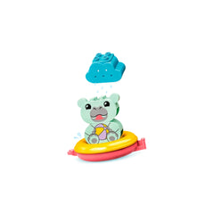 Colorful LEGO DUPLO floating animal train with a smiling hippo in a yellow and pink ring, topped by a playful blue rain cloud.