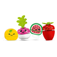 Colorful LEGO® DUPLO® fruits including a lemon, pink radish, watermelon, and red strawberry, each with playful facial expressions.