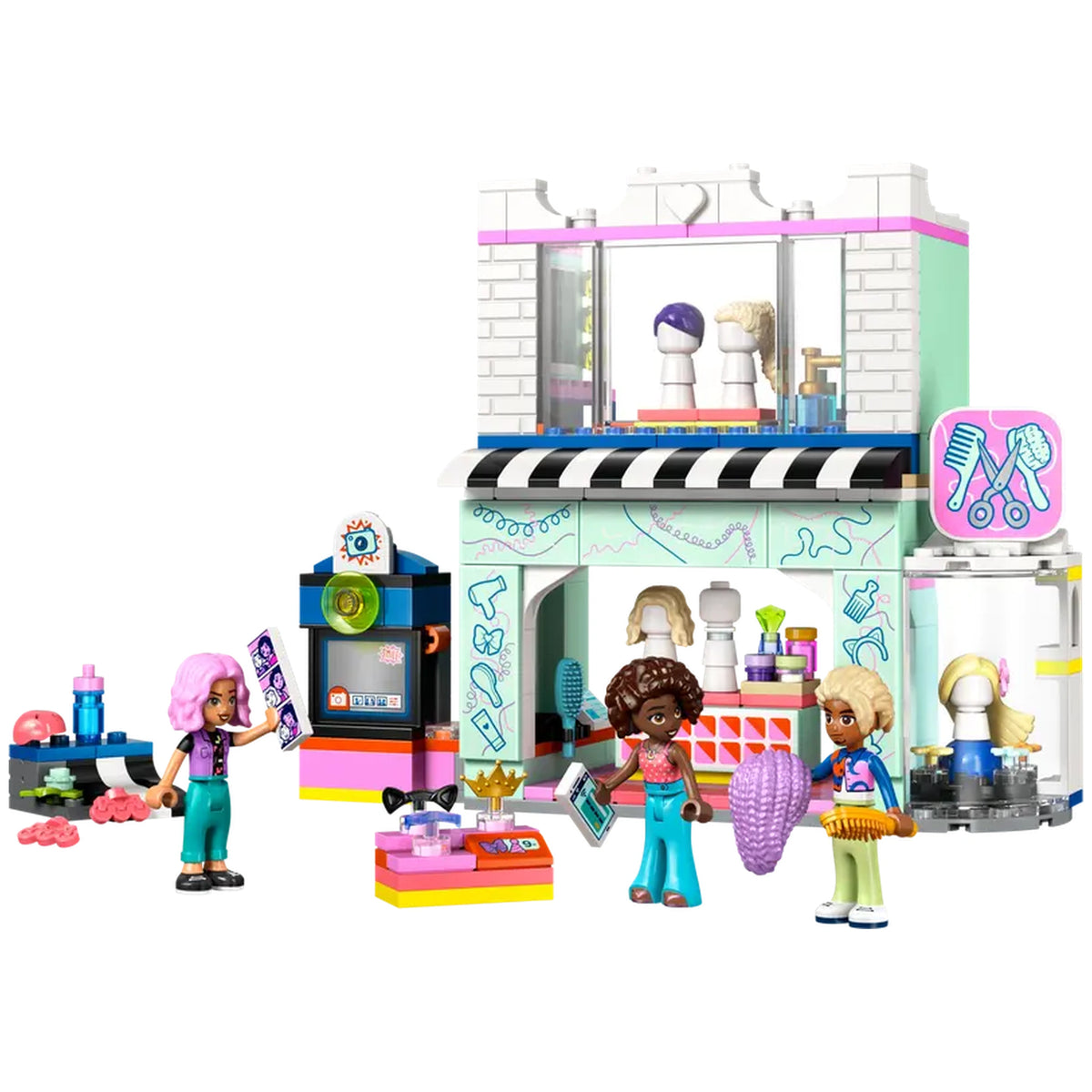 Three LEGO Friends mini-dolls in colorful outfits stand outside a vibrant Hair Salon and Accessories Store. The shop features a striped awning, large windows, and various hair accessories on display. One doll holds a magazine, while another features a hairbrush, and the third has a decorative shell. The scene is lively, inviting imaginative play for kids aged 7 and up.