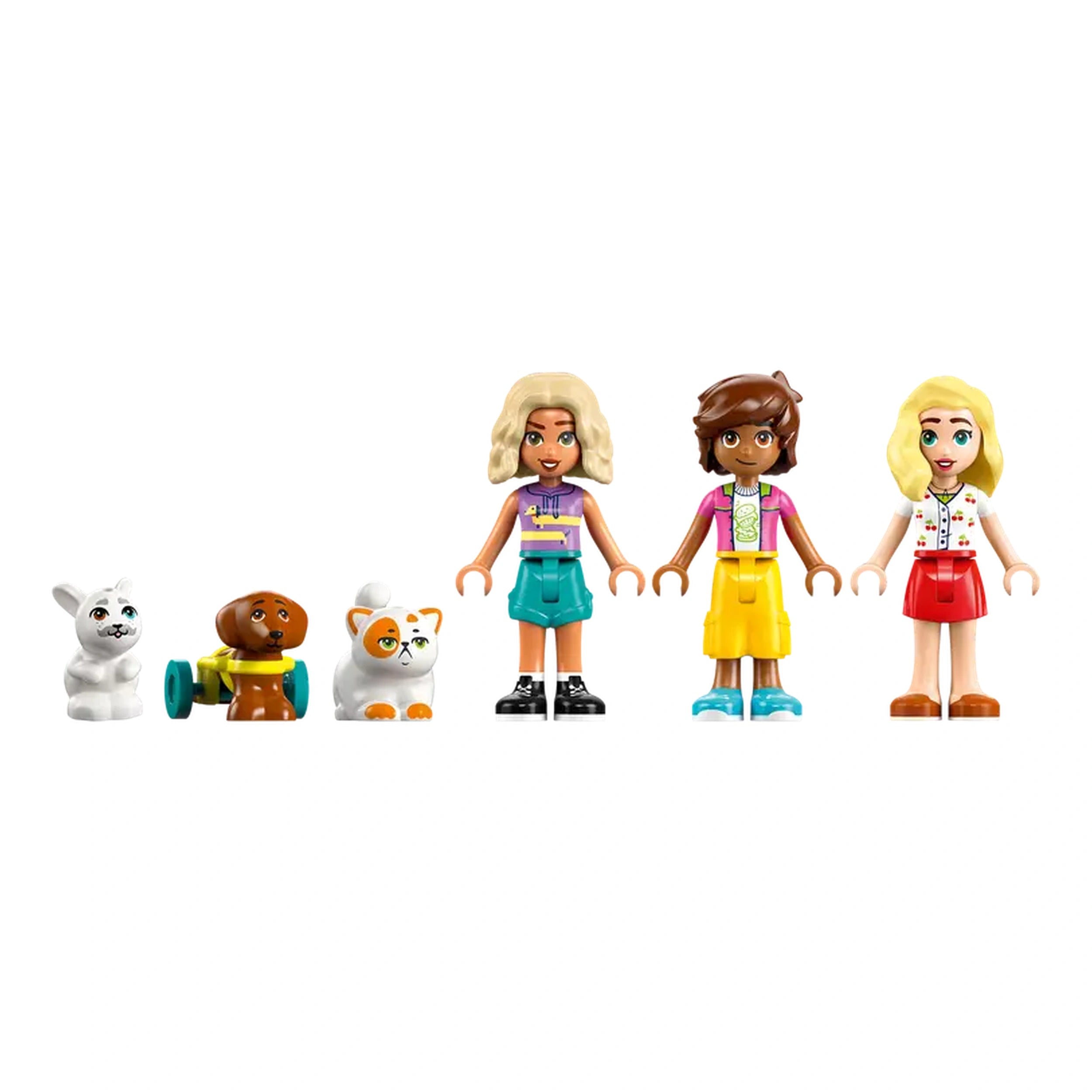 Three LEGO® Friends minidolls stand side by side, each dressed in colorful outfits. To their left, a white rabbit, a brown dog with a toy, and a cat with orange patches complete the scene. The background is plain, emphasizing the playful pet accessories theme.