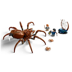 LEGO® Harry Potter™ Aragog construction set featuring a large brown spider with posable legs, alongside minifigures of Harry and Ron holding wands.