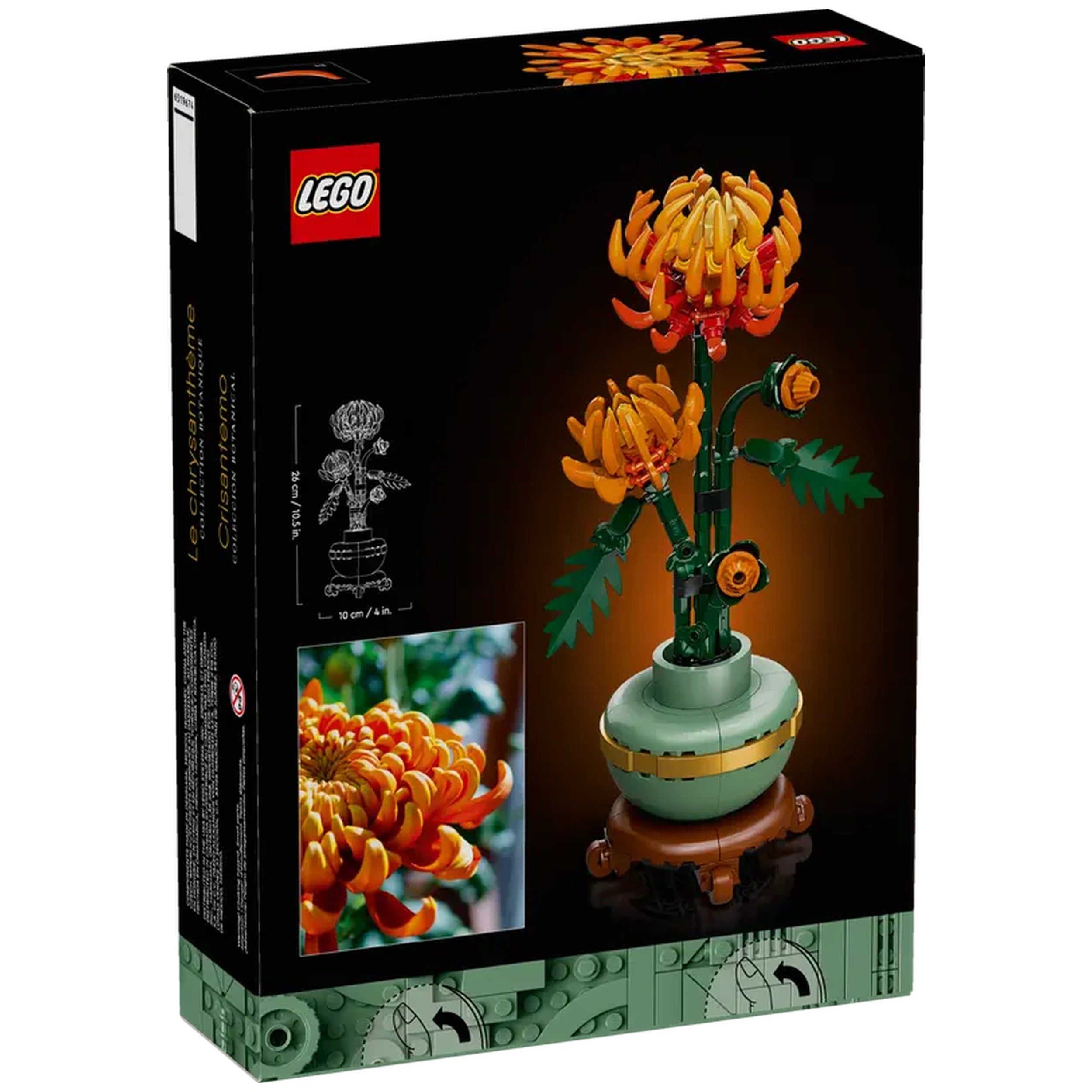 LEGO® Icons Chrysanthemum construction set featuring vibrant orange flowers in full bloom, posable green leaves, and a pastel green pot with a golden band, displayed against a dark background.